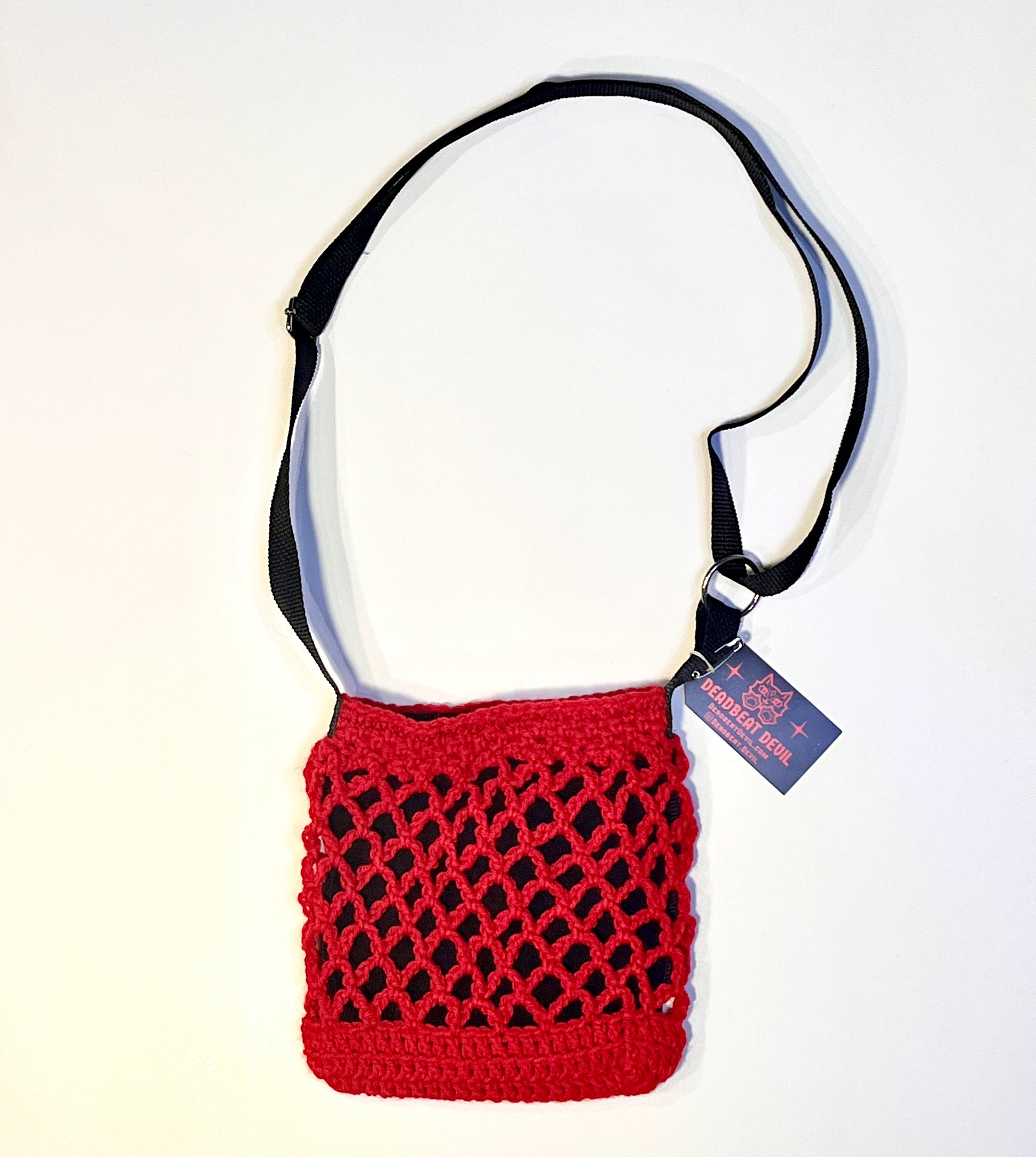 Elevate your style with the beautifully handcrafted Red Crochet Shoulder Mini Bag. Designed with both fashion and functionality in mind, this mini bag is perfect for those who appreciate unique accessories that make a statement.