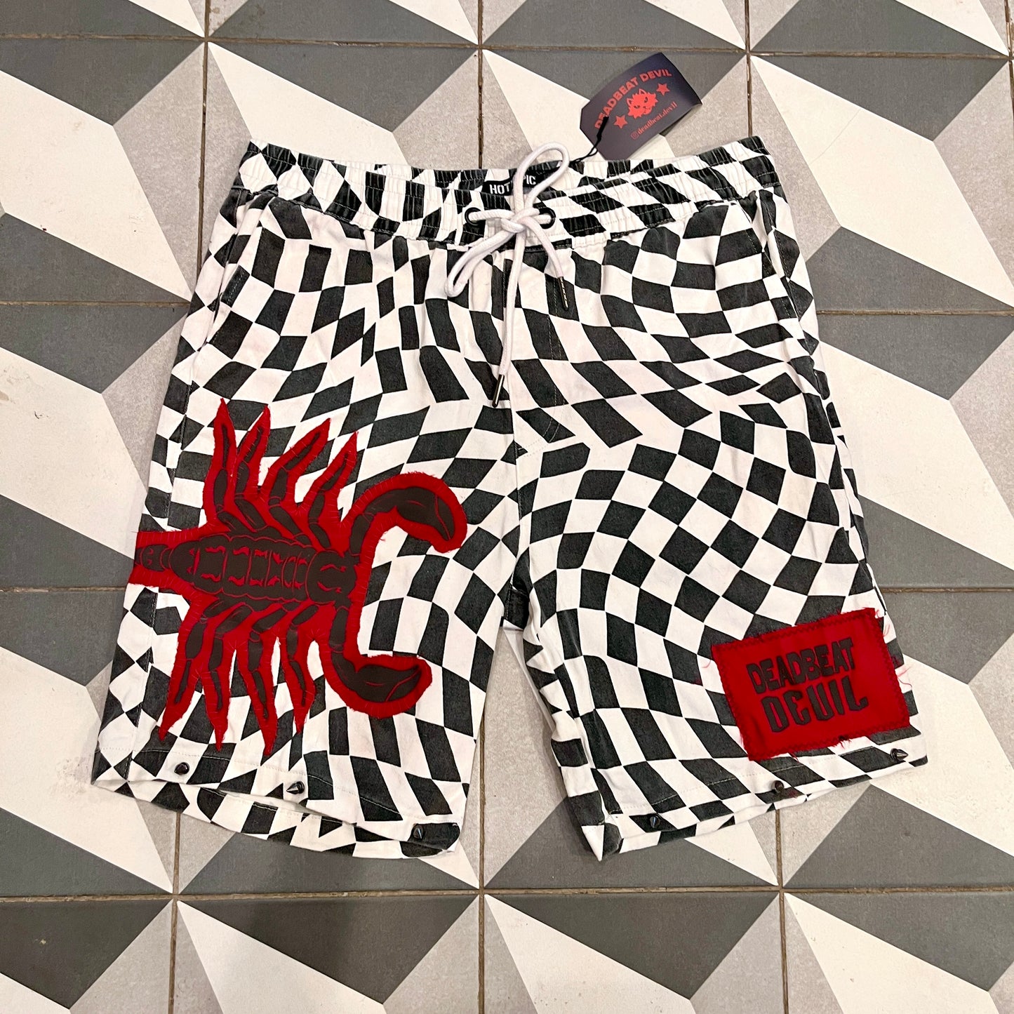 Checkered Patchwork Scorpion Shorts