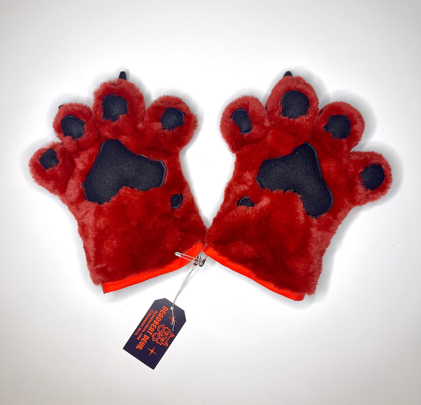 Red and Black Furry Paws